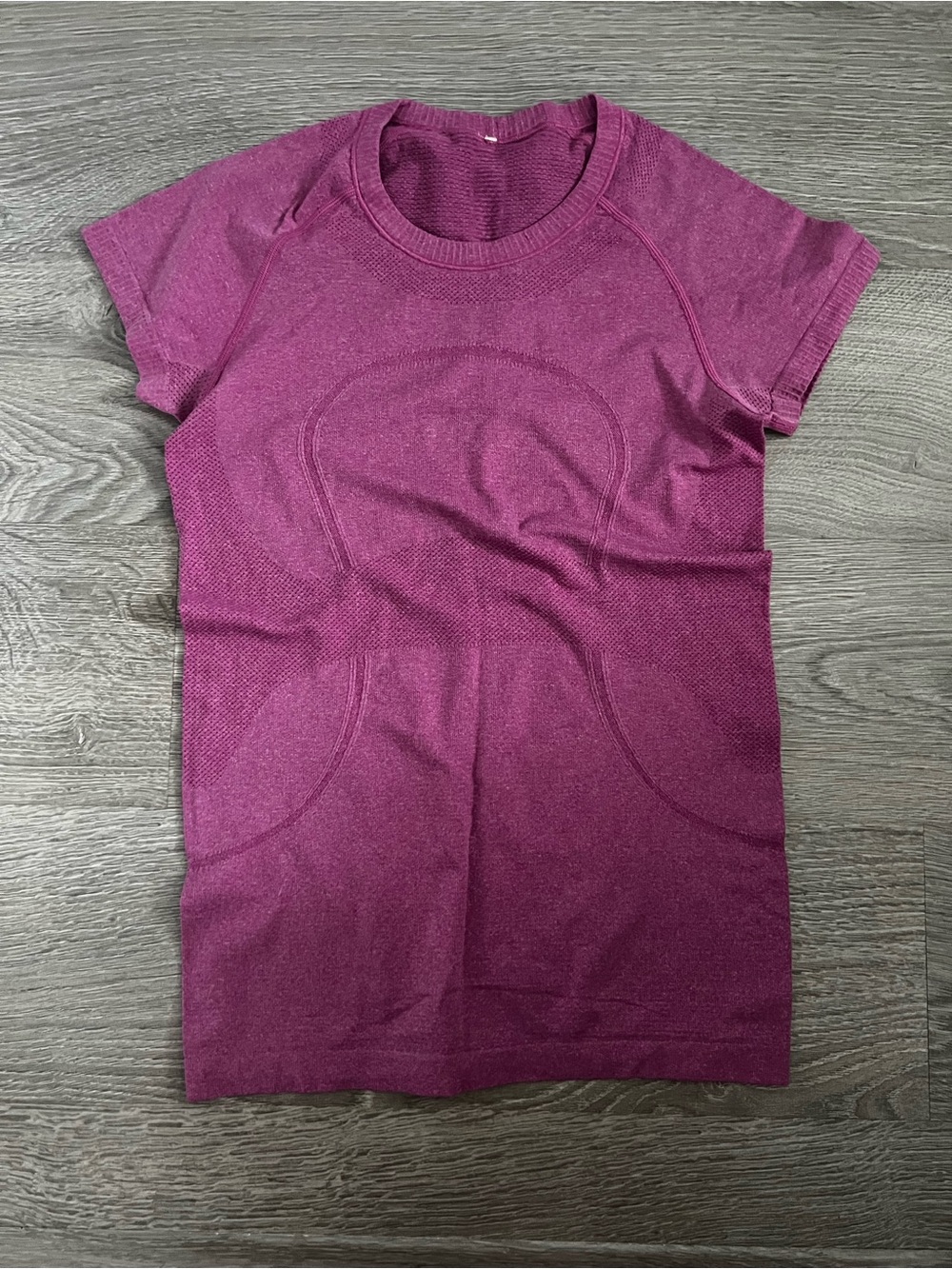 lululemon athletica Short Sleeve swiftly - berry pink colour. Size 8